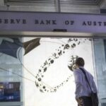 Australia's central bank signals more tightening ahead after hiking rates to decade high