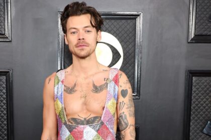 Harry Styles' Grammy fashion: Rainbow jumpsuit divides social media