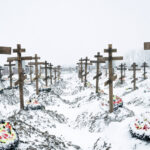 In Bleak Russian Cemetery, Sea of Crosses Signals War’s True Toll