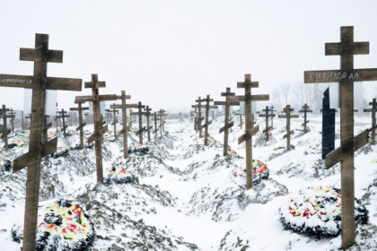 In Bleak Russian Cemetery, Sea of Crosses Signals War’s True Toll