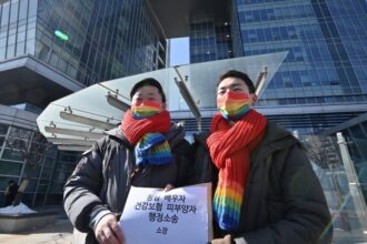 In a first, South Korean court grants gay couple health benefits