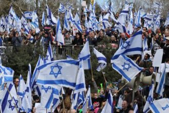 Thousands protest Netanyahu's plan to weaken Israel's judiciary as president warns of 'social collapse'