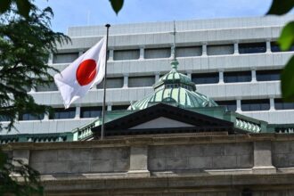 Asian bank stocks sink as Credit Suisse fear roils markets