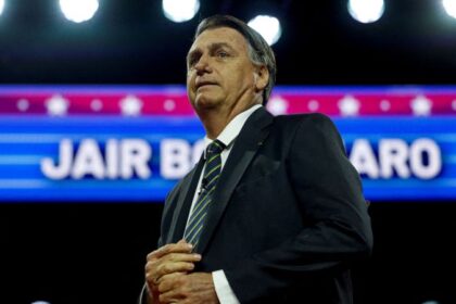 Bolsonaro claims he won't lead opposition as he returns to Brazil for first time since riots