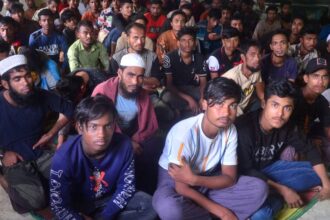 Nearly 200 Rohingya people land by boat in Indonesia's Aceh