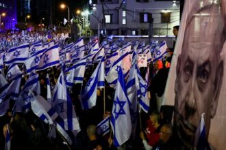 Netanyahu government makes first climbdown on plan to weaken Israel's judiciary