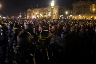 Protesters in Paris Clash With Police Over Retirement Age Change