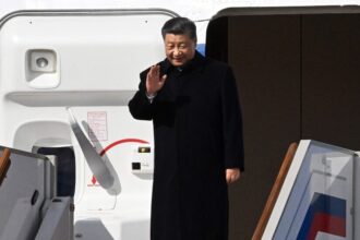 Xi Arrives in Moscow to Meet Putin