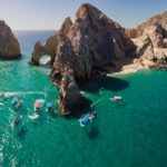 Downward Looking Aerial of the shallow water in Cabo San Lucas, Baja California Sur, Mexico near the Darwin Arch glass bottom boats viewing sealife