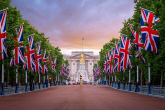 Buckingham Palace, The Mall, Union Flags, London, England