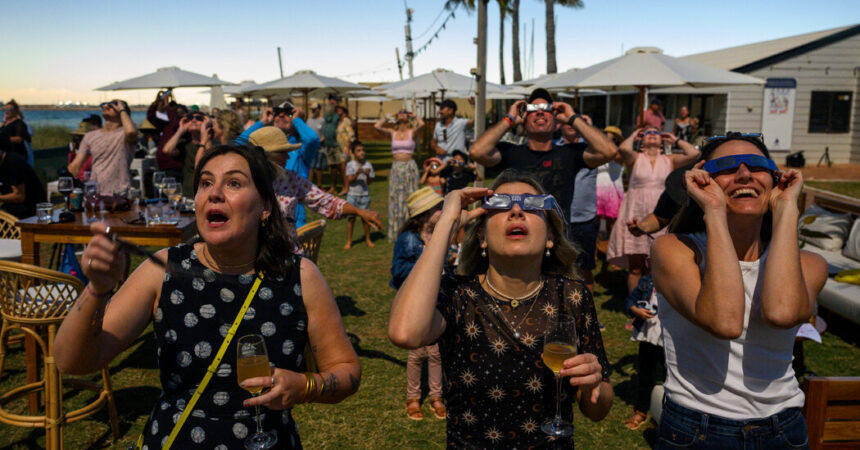 Flocking to One of the Few Specks of Land in Sight of a Total Eclipse