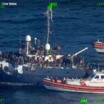 Italy migrant boats: Italian Coast Guard escorting barges carrying 1,200 migrants in Mediterranean Sea