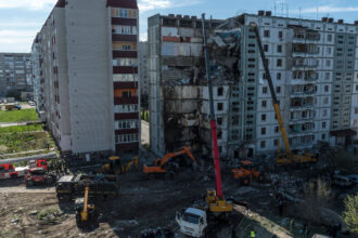 Russian Rocket Destroys Apartment Block in Central Ukraine