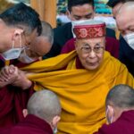 Tibetan leader defends Dalai Lama after video kissing boy on the lips in India