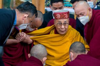 Tibetan leader defends Dalai Lama after video kissing boy on the lips in India