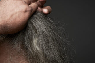 Your Hair Is Going Gray. This Glitch May Explain Why.