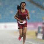 Cambodian Runner Finishes Race Despite Torrential Rain