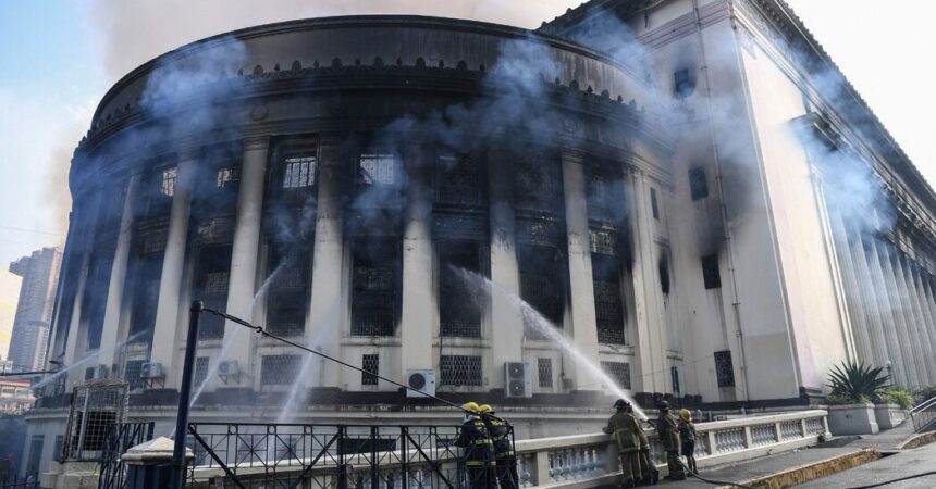 Firefighters Battle Blaze at Historic Building in Philippines