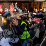 French police fire tear gas at climate protesters