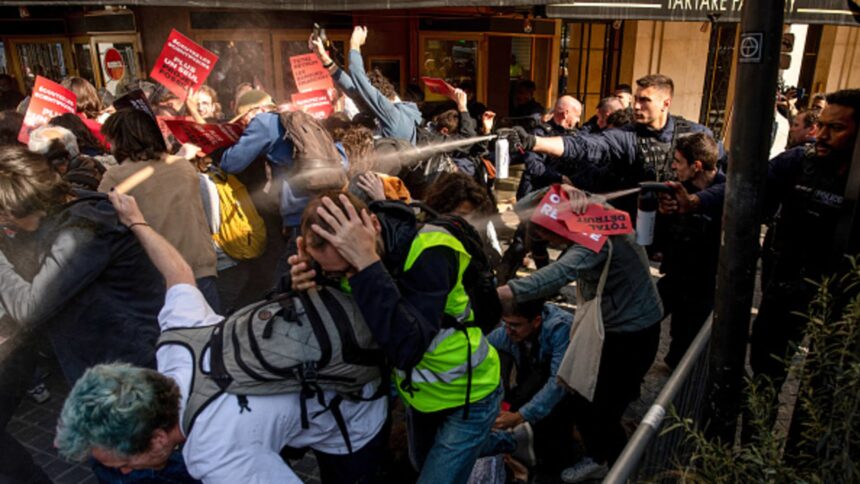 French police fire tear gas at climate protesters