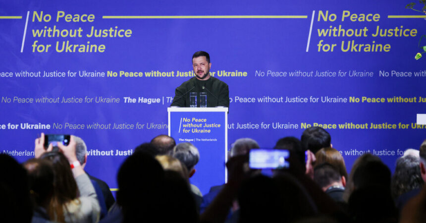 In The Hague, Zelensky Renews Call to Prosecute Russian War Crimes