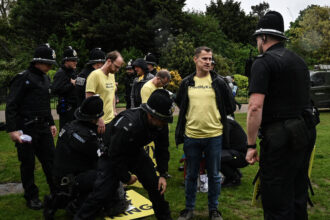 London Police Arrest Dozens of Protesters on Day of Coronation