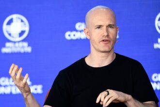 SEC sues Coinbase over exchange and staking programs, stock drops 22%