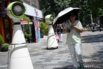 As China Bakes in Record Heat, John Kerry Presses Beijing on Climate Change