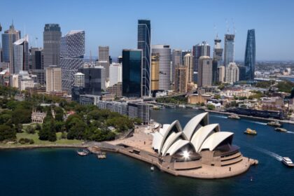 Australia's central bank leaves its key rate unchanged, says inflation 'passed its peak'