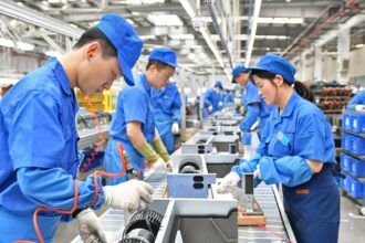 China's factory activity grew more slowly in June, Caixin survey shows