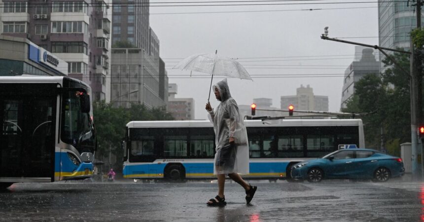 Flash Floods and Landslides Sweep Chinese Cities