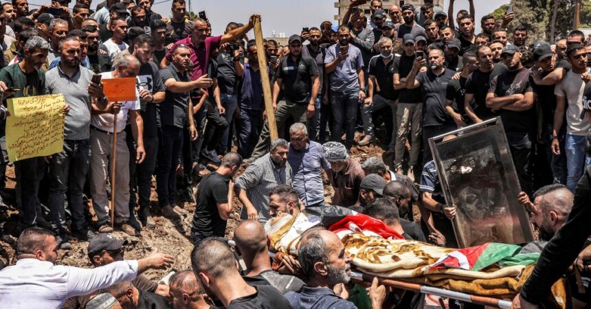 Mass Funeral Held for Palestinians Killed in Israeli Raid