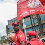 Security members ride on a motorcycle before the arrival of Ugandan singer turned politician Robert Kyagulanyi aka Bobi Wine as he becomes President of his new political party National Unity Platform (NUP) near NUP headquaters in Kampala, Uganda, on August 21, 2020.