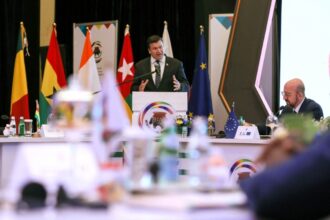 British Armed Forces Minister James Heappey (L) speaks next to European Council President Charles Michel (R), during the Accra Initiative summit on West Africa counter-terrorism cooperation which gathered heads of state and government in Accra on November 22, 2022.