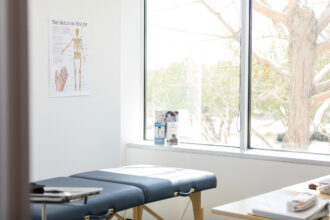 Empty medical examination room prepared for the next patient