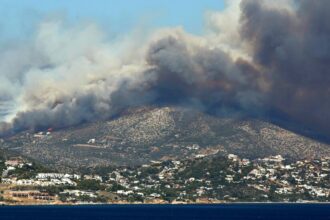 Wildfires Force Residents to Flee Greek Seaside Villages