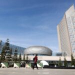 A delegate arrives at the African Union Commission (AUC) headquarters during the 35th ordinary session of the Assembly of the African Union in Addis Ababa, on 6 February 2022.