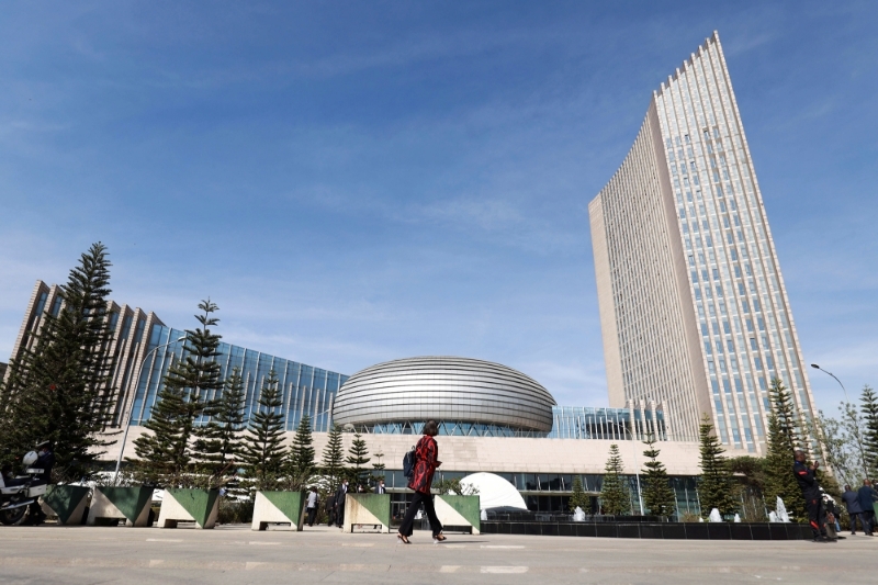 A delegate arrives at the African Union Commission (AUC) headquarters during the 35th ordinary session of the Assembly of the African Union in Addis Ababa, on 6 February 2022.