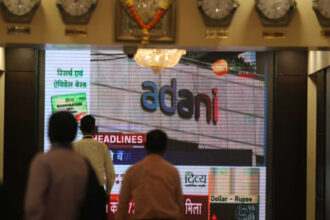 Adani Capital deal will allow access to India's 'underbanked': Bain