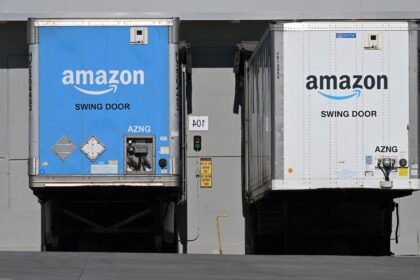 Amazon surges as Apple stumbles