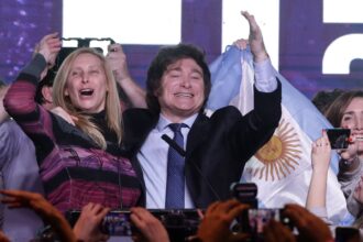 Argentina devalues its currency, jacks up interest rates