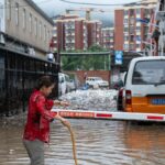 China's capital Beijing battered by heaviest rainfall in 140 years