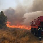 Europe battles wildfires, heavy rain and shipping disruption