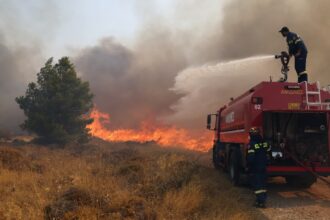 Europe battles wildfires, heavy rain and shipping disruption