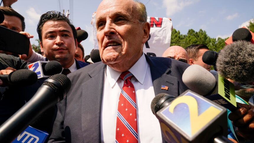 Judge orders Rudy Giuliani default judgment in election worker lawsuit