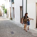 Mother and son playing on the street