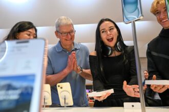 Apple CEO Tim Cook appears in New York to celebrate iPhone 15 release