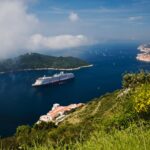 Cruise ship in Adriatic Sea with Dubrovnik in background