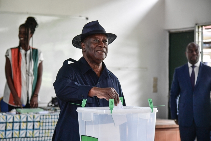 Ivorian president Alassane Ouattara casts his ballot during the municipal and regional elections, in Abidjan, on 2 September 2023.