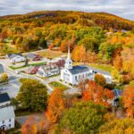 Trees and houses against sky during autumn,Main St,United States,USA